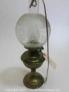 Collectible: Kerosene lamp: Electrified: 22"T Brass Base and Frosted Glass Globe; hallmarked on base