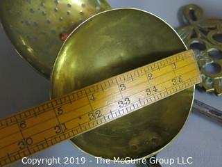 Collectible: Kitchen: Brass: Collection of antique brass including pitcher, two ladles and a trivet