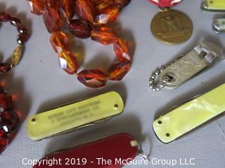 Collectibles: (WYSIWYG) Collection including assorted Men's Pocket Knives, necklaces, military medal (does not include box)