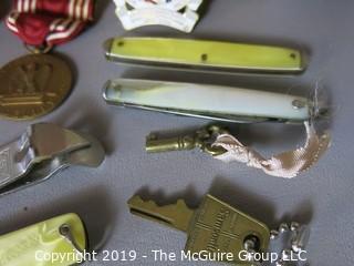 Collectibles: (WYSIWYG) Collection including assorted Men's Pocket Knives, necklaces, military medal (does not include box)