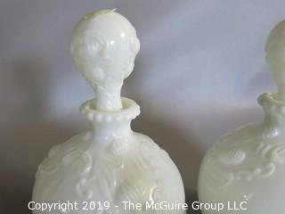 Milk-glass: Three embossed decanters, two with stoppers