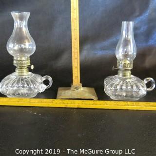 Two oil lamps