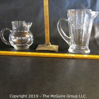 Two (2) blown glass pitchers