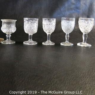 Assortment of Five Stemmed EAPG Glasses