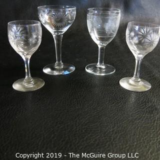 Four EAPG etched glasses