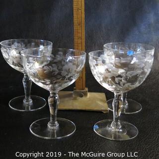 Five etched stemmed glasses