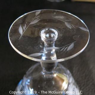 Five etched stemmed glasses