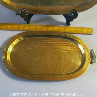 Two Hammered Metal Trays