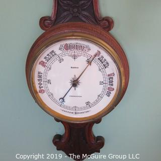 Aneroid Wall Barometer/Thermometer in Carved Oak Case; 30" T; barometer marked "Cirencester; Norris"