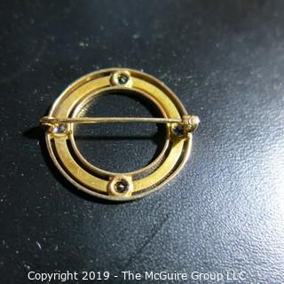 Jewelry: Circle pin, 14K yellow gold, 4 eye-clean bright blue sapphires measuring 1 1/16" diameter; 4.2 grams; (TMG 784) {Note: Description altered Nov. 20 @ 4:38pm ET}