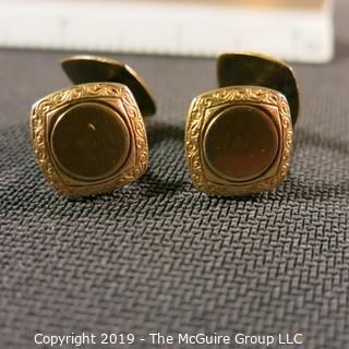 Jewelry: One pair gold-filled cuff links, ½ in. rounded squares with engraved border and center open for an initial. 