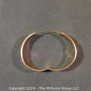 Jewelry: Vintage 10K Rose gold bangle with etched daisy, monogrammed, 65 x 57 mm, moderate wear; 13.1 grams. (TMG 745)