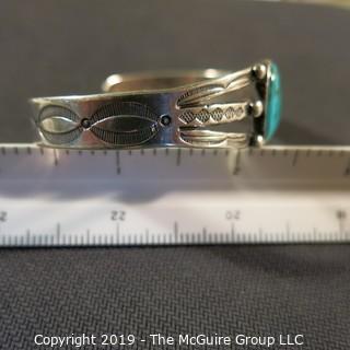 Jewelry: Fred Harvey Style Navajo Cuff with 12 x 17 mm bezel set turquoise cabochon. No hallmark, but likely Sterling or coin silver.