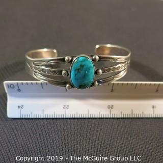 Jewelry: Fred Harvey Style Navajo Cuff with 12 x 17 mm bezel set turquoise cabochon. No hallmark, but likely Sterling or coin silver.