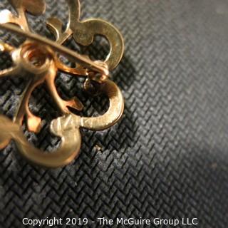 Jewelry:  Vintage floral motif, 14K. Seed pearl,  3 point center diamond brooch, 24 mm diameter; 2.9 grams (TMG 777)