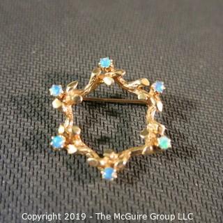 Jewelry: Mid-20th C. 14K Yellow gold, 6-pointed star brooch, 20 x 26 mm, with 6 vibrant blue green opals; 5 grams total weight; (TMG 775)