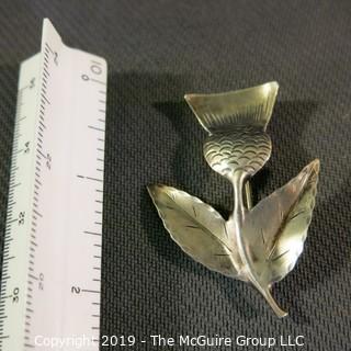 Jewelry:  2.25 x 1.75 Sterling etched Thistle brooch, primitive style.  Good condition.