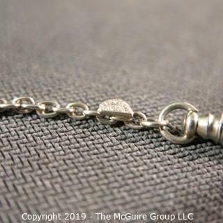 Jewelry: Cresent brand 14K white gold watch chain, with angular elongated diamond links, spring ring and bezel clasp, approx. 11 grams (TMG 739). 