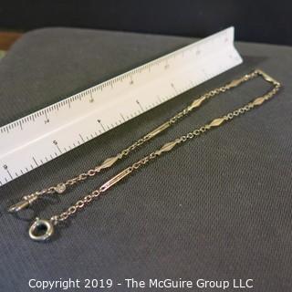 Jewelry: Cresent brand 14K white gold watch chain, with angular elongated diamond links, spring ring and bezel clasp, approx. 11 grams (TMG 739). 