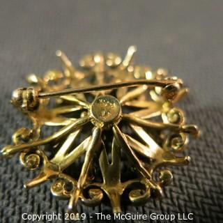 Jewelry: Vintage 14K garnet brooch, star inside an ornate circle, measuring 26.5 mm; 5.7 grams total weight; (TMG 774) 