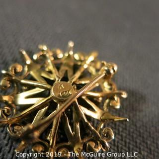 Jewelry: Vintage 14K garnet brooch, star inside an ornate circle, measuring 26.5 mm; 5.7 grams total weight; (TMG 774) 