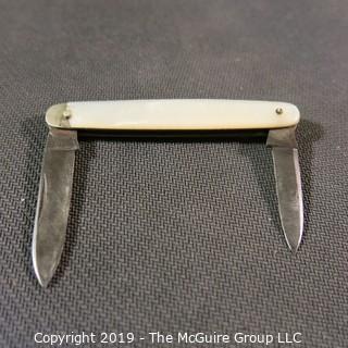 Jewelry: Case, 2&5/8" Mother of Pearl 2- blade pocket knife.  Has moderate wear. 