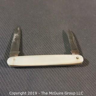 Jewelry: Case, 2&5/8" Mother of Pearl 2- blade pocket knife.  Has moderate wear. 