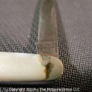 Jewelry: Case, 2&5/8" Mother of Pearl 2- blade pocket knife.  Has moderate wear. 