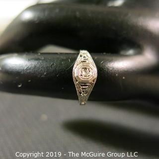 Jewelry: Early 19th C. filigree 18K White gold tiny child’s ring, with 1 point old cut diamond in original box; 0.6 gram; (TMG 0772)