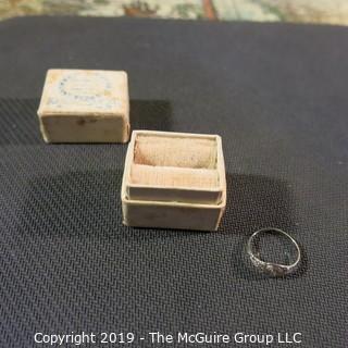 Jewelry: Early 19th C. filigree 18K White gold tiny child’s ring, with 1 point old cut diamond in original box; 0.6 gram; (TMG 0772)