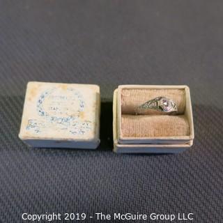 Jewelry: Early 19th C. filigree 18K White gold tiny child’s ring, with 1 point old cut diamond in original box; 0.6 gram; (TMG 0772)