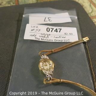 Jewelry: Ladies Mid-20th Century 14K Yellow gold Elgin watch with diamond accents, 22 x 15mm case with 10K GF braided rope watch band; total weight 11.4 grams 