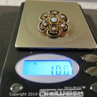 Jewelry:European style, 14K brooch/pendant, 1 X 1¼ in. 6 petal floral motif with opal accents and black enamel outline; 9.9 grams total weight; TMG 787)