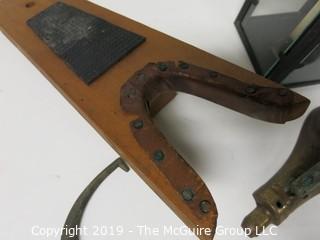 Collectible: Antique: Collection including pistol form brass doorknocker, glass enclosed candle lantern and vintage boot jack 