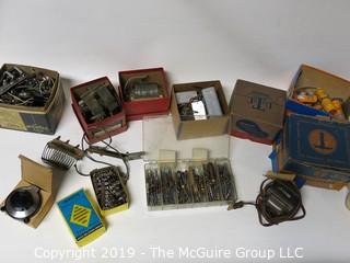 Collection of M-C Electronic Components including transformers, capacitors, air inductors, timers and switches