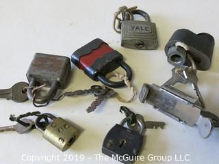 Assortment of vintage padlocks with keys