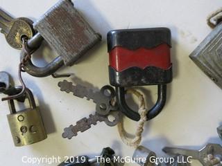 Assortment of vintage padlocks with keys