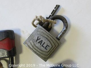 Assortment of vintage padlocks with keys