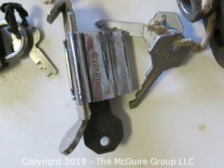 Assortment of vintage padlocks with keys