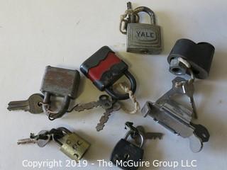 Assortment of vintage padlocks with keys