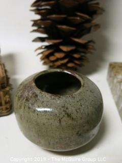 One very large pine cone; marble ash tray, box of buttons and signed ceramic pottery bowl