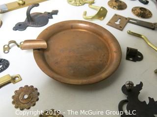 Assortment including M-C Copper Ashtray, denture powder and door hardware  