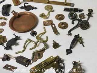 Assortment including M-C Copper Ashtray, denture powder and door hardware  