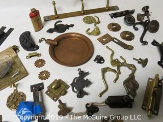 Assortment including M-C Copper Ashtray, denture powder and door hardware  