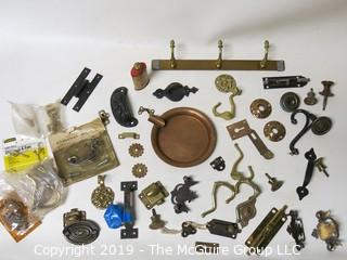 Assortment including M-C Copper Ashtray, denture powder and door hardware  