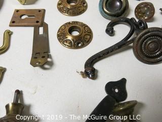 Assortment including M-C Copper Ashtray, denture powder and door hardware  