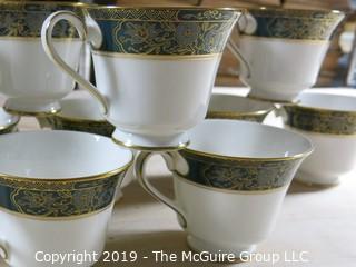 (83) Piece Set of Royal Doulton English Bone China; Carlyle Pattern; 7 piece settings; (12) dinner plates; (12) salad Plates; (12) dessert plates; (11) coffee saucers; (12) coffee cups; (12) demi-tasse Cups; (12) demi-tasse saucers