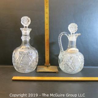 Two (2) EAPG Decanters w/ stoppers 1 w/ handle