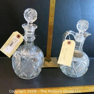 Two (2) EAPG Decanters w/ stoppers 1 w/ handle