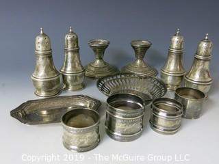 Collectible: Silver: Collection of Sterling including napkin rings, salt and pepper shakers and weighted candlesticks; 650g total weight